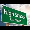  Words "high school just ahead" on a street sign